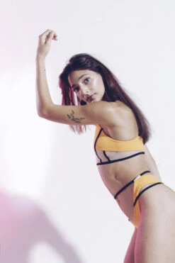 MilaKrasna Pia Top - Marigold 8 MilaKrasna Pia Top - Marigold -Clothing Store MilaKrasna poledance pia bottom marigold side editorial 02ba8928 1367 4971 aefc 64ae05592563